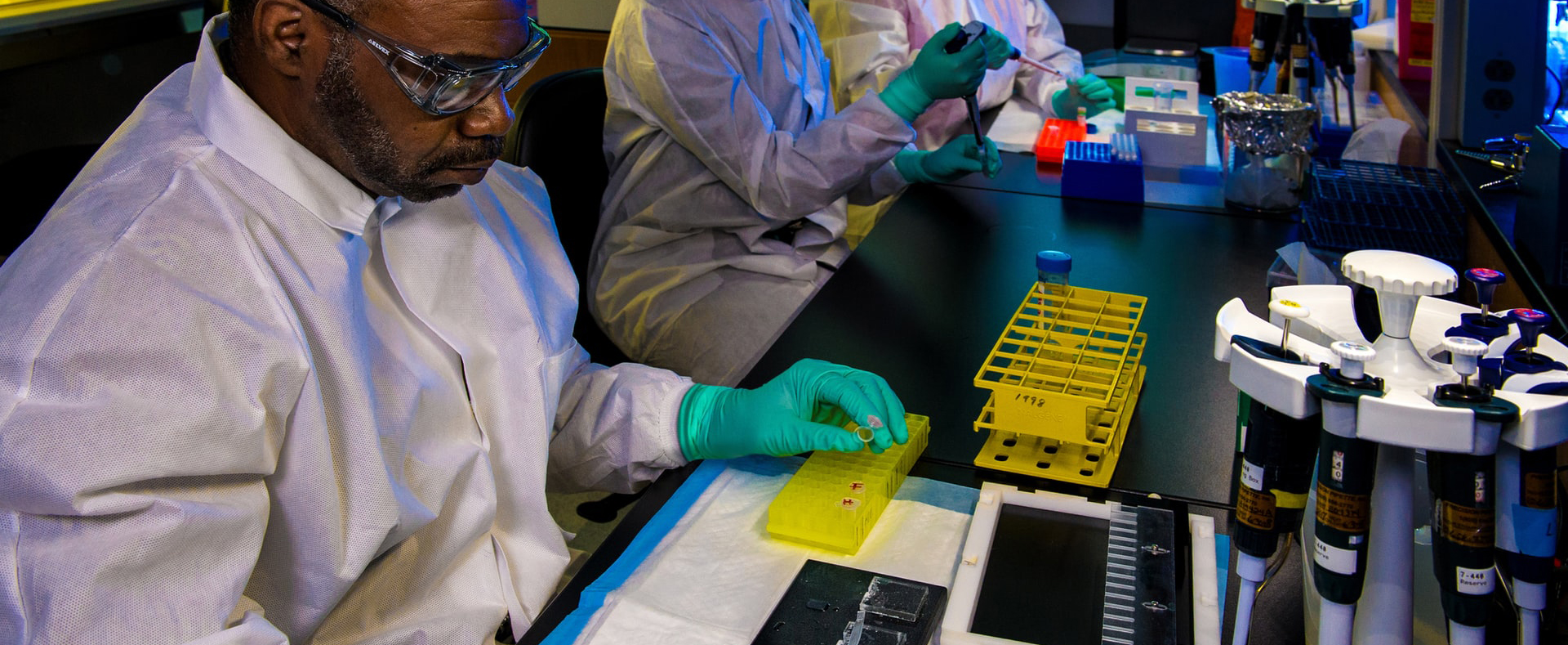 research technician filling yellow container