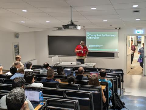 Professor Mourning giving a presentation.