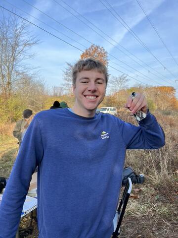 TJ holding a WBNU