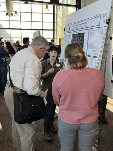 Olive presenting poster
