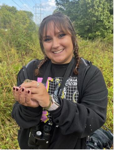 Veronica holding a warbler