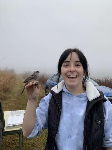 Olive holding a bird