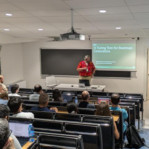 Professor Mourning giving a presentation.